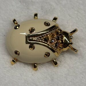 St. John Cream and Gold Ladybug Brooch
